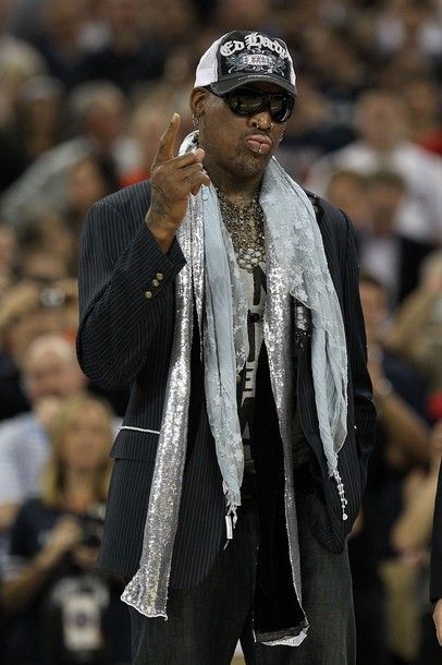 HOUSTON, TX - APRIL 04:  Naismith Memorial Basketball Hall of Fame 2011 inductee Dennis Rodman looks on during halftime of the National Championship Game of the 2011 NCAA Division I Men's Basketball Tournament at Reliant Stadium on April 4, 2011 in Houston, Texas.  (Photo by Ronald Martinez/Getty Images)