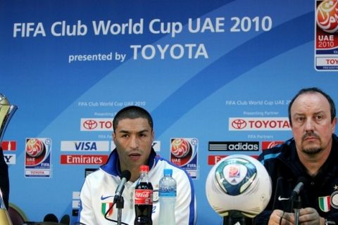 Inter Milan's Colombian defender Ivan Cordoba speaks during a joint press conference with coach Rafael Benitez (R) at Zayed Sports City on the sidelines of the FIFA Club World Cup in the Emirati capital of Abu Dhabi on December 11, 2010. AFP PHOTO/MARWAN NAAMANI (Photo credit should read MARWAN NAAMANI/AFP/Getty Images)