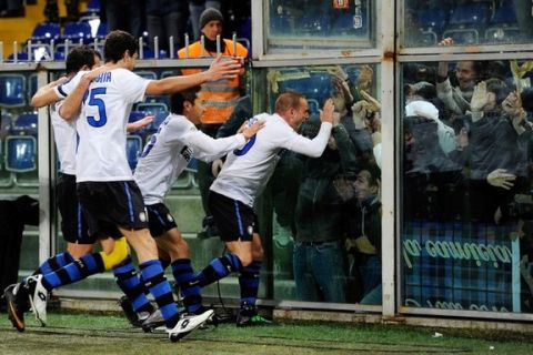 GENOA, ITALY - FEBRUARY 27:  Wesley Sneijder (R) of FC Inter Milan celebrates after scoring the opening goal during the Serie A match between UC Sampdoria and FC Internazionale Milano at Stadio Luigi Ferraris on February 27, 2011 in Genoa, Italy.  (Photo by Claudio Villa/Getty Images)