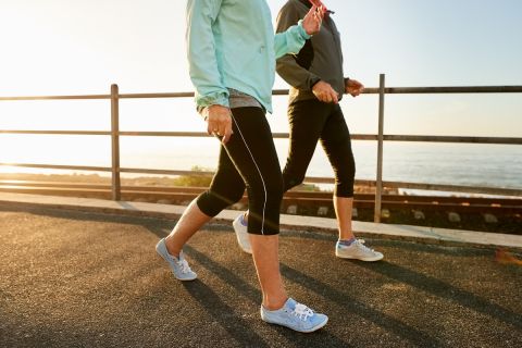 Cropped shot of two senior women walking together in morning