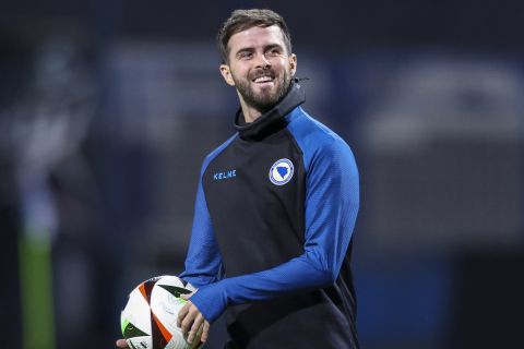 Bosnia's Miralem Pjanic smiles during a training session at the Grbavica stadium in Sarajevo, Bosnia, Tuesday, March 19, 2024. Bosnia will play EURO 2024 playoff soccer match against Ukraine on Thursday. (AP Photo/Armin Durgut)