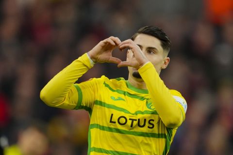 Norwich City's Borja Sainz celebrates after scoring his side's second goal during the English FA Cup fourth round soccer match between Liverpool and Norwich, at Anfield stadium in Liverpool, England, Sunday, Jan. 28, 2024. (AP Photo/Jon Super)