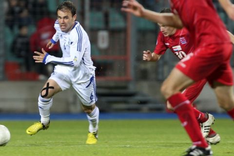 Israel's Bebras Natchois runs for the ball during a World Cup Group F qualifying soccer match against Luxembourg at the Josy Barthel stadium in Luxembourg, Friday Oct. 12, 2012. (AP Photo/Yves Logghe) 