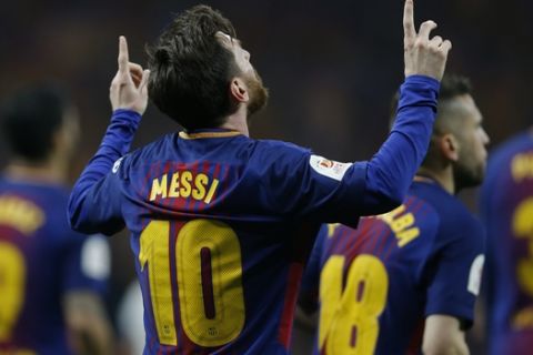 Barcelona's Lionel Messi celebrates after scoring second goal against Sevilla during the Copa del Rey final soccer match between Barcelona and Sevilla at the Wanda Metropolitano stadium in Madrid, Spain, Saturday, April 21, 2018. (AP Photo/Francisco Seco)