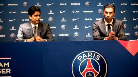 PSG's new signing goalkeeper Gianluigi Buffon, right, and PSG president Nasser Ghanim Al-KhelaÔfi hold a joint press conference as part of Buffon's official presentation at the Parc des Princes stadium in Paris, France, Monday, July 9, 2018. Free agent Gianluigi Buffon signed for Paris Saint-Germain last Friday. The veteran goalkeeper penned a one-year deal at the French champion with the option for an additional season. (AP Photo/Jean-Francois Badias)