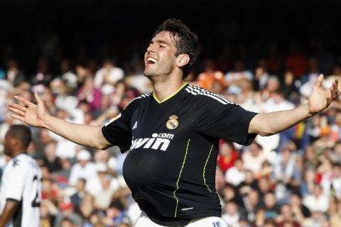 Real Madrid's Kaka celebrates after he scored a goal against Valencia during their Spanish first division soccer match at the Mestalla Stadium in Valencia April 23, 2011.      REUTERS/Heino Kalis (SPAIN - Tags: SPORT SOCCER)