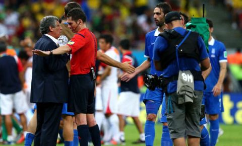 RECIFE, BRAZIL - JUNE 29: Referee Benjamin Williams (2nd L) speaks with head coach Fernando Santos (1st L) of Greece during the 2014 FIFA World Cup Brazil Round of 16 match between Costa Rica and Greece at Arena Pernambuco on June 29, 2014 in Recife, Brazil.  (Photo by Ryan Pierse - FIFA/FIFA via Getty Images)