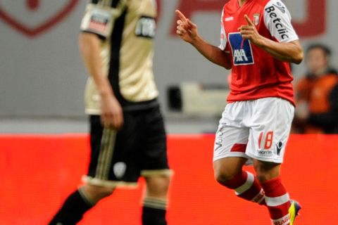 SC Braga's Brazilian forward Rodrigo Lima (R) celebrates after scoring a goal during the Portuguese super league football match SC Braga vs SL Benfica at the Municipal Stadium in Braga, on november 6, 2011. AFP PHOTO / MIGUEL RIOPA (Photo credit should read MIGUEL RIOPA/AFP/Getty Images)