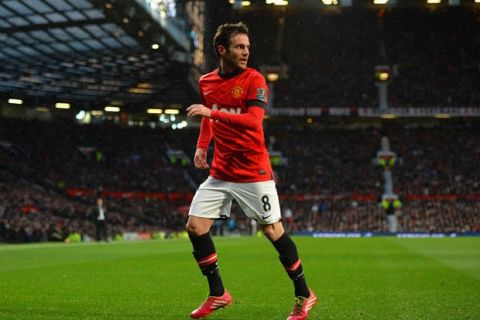 MANCHESTER, ENGLAND - FEBRUARY 09:  Juan Mata of Manchester United looks on during the Barclays Premier League match between Manchester United and Fulham at Old Trafford on February 9, 2014 in Manchester, England.  (Photo by Michael Regan/Getty Images)