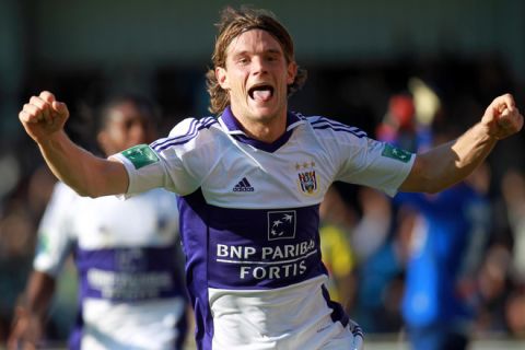 Anderlecht's Guillaume Gillet celebrates after scoring a goal during the Jupiler Pro League match between Westerlo and RSC Anderlecht, in Westerlo, on October 23, 2011, on the eleventh day of the Belgian football championship. AFP PHOTO/BELGA/VIRGINIE LEFOUR   -- BELGIUM OUT-- (Photo credit should read VIRGINIE LEFOUR/AFP/Getty Images)