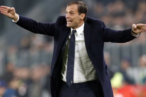 Juventus coach Massimiliano Allegri gestures during the Champions League group D soccer match between Juventus and Barcelona, at the Allianz Stadium in Turin, Italy, Wednesday, Nov. 22, 2017. (AP Photo/Antonio Calanni)