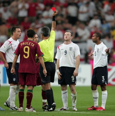 DECADE REVIEW - Sport. Soccer - FIFA World Cup Quarter Final - England v Portugal - Gelsenkirchen. England's Wayne Rooney is sent off after stamping on Portugal's Alberto Ricardo Carvalho during the Quarter Final match at the FIFA World Cup Stadium in Gelsenkirchen, Germany. PRESS ASSOCIATION Photo. Picture date: 1 July, 2006. Photo credit should read: Martin Rickett/PA Wire