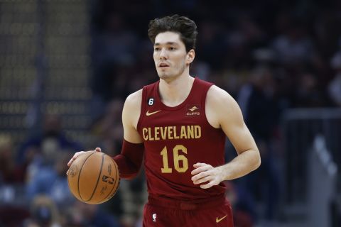 Cleveland Cavaliers forward Cedi Osman plays against the Indiana Pacers during the first half of an NBA basketball game, Friday, Dec. 16, 2022, in Cleveland. (AP Photo/Ron Schwane)