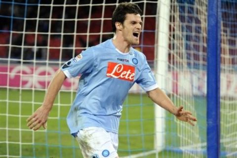 Napoli's Christian Maggio reacts, after scoring during a Serie A soccer match between Napoli and Palermo in Naples' San Paolo stadium, Italy, Monday, Dec. 6, 2010.  (AP Photo/Salvatore Laporta)