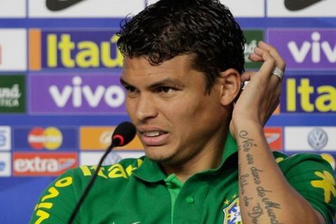 Brazil's Thiago Silva reacts during a news conference in Brasilia, Brazil, Sunday, June 16, 2013. Brazil play in group A of the soccer Confederations Cup.  (AP Photo/Eraldo Peres)