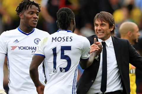 Chelsea's Victor Moses and Manager Antonio Conte celebrate after the final whistle of the Premier League match at Vicarage Road, Watford. PRESS ASSOCIATION Photo. Picture date: Saturday August 20, 2016. See PA story SOCCER Watford. Photo credit should read: John Walton/PA Wire. RESTRICTIONS: EDITORIAL USE ONLY No use with unauthorised audio, video, data, fixture lists, club/league logos or "live" services. Online in-match use limited to 75 images, no video emulation. No use in betting, games or single club/league/player publications.