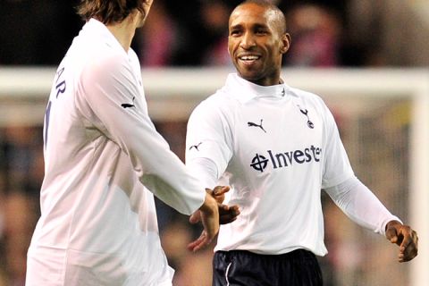 Tottenham Hotspur's English striker Jermain Defoe (R) celebrates scoring his first goal with Croatian midfielder Niko Kranjcar (L) during their FA Cup fifth round replay football match against Stevenage at White Hart Lane, London, England, on March 7, 2012. AFP PHOTO/GLYN KIRK

RESTRICTED TO EDITORIAL USE. No use with unauthorized audio, video, data, fixture lists, club/league logos or âliveâ services. Online in-match use limited to 45 images, no video emulation. No use in betting, games or single club/league/player publications. (Photo credit should read GLYN KIRK/AFP/Getty Images)