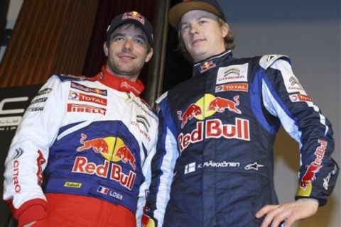 Citroen Total World Rally team drivers, five-time rally world champion Sebastien Loeb of France, left, and former Formula One driver Kimi Raikkonen of Finland pose during the launch event for the 2010 FIA World Rally Championship season, Tuesday Feb .2 2010 at the headquarters of the FIA in Paris. (AP Photo/Jacques Brinon)