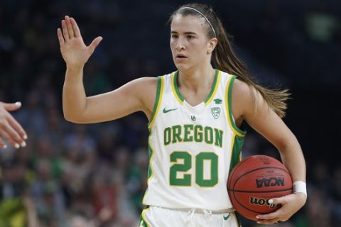 Oregon's Sabrina Ionescu (20) plays against Stanford during an NCAA college basketball game in the final of the Pac-12 women's tournament Sunday, March 8, 2020, in Las Vegas. (AP Photo/John Locher)