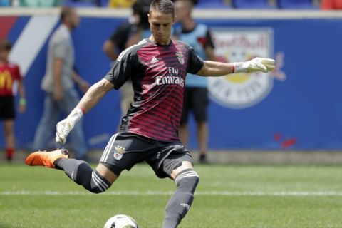 Benfica goalkeeper Odisseas Vlachodimos clears the ball away during the first half of an International Champions Cup tournament soccer match against Juventus, Saturday, July 28, 2018, in Harrison, N.J. (AP Photo/Julio Cortez)