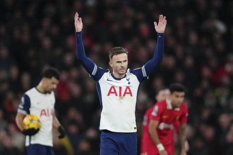 Tottenham's James Maddison celebrates after scoring his side's first goal during the English Premier League soccer match between Tottenham and Liverpool at Tottenham Hotspur Stadium in London, Sunday, Dec. 22, 2024. (AP Photo/Dave Shopland)