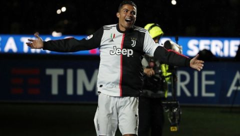 Juventus' Cristiano Ronaldo celebrates at the end of the Serie A soccer match between Juventus and Atalanta at the Allianz stadium, in Turin, Italy, Sunday, May 19, 2019. (AP Photo/Antonio Calanni)