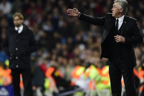 Real Madrid's Italian coach Carlo Ancelotti gestures during the UEFA Champions League quarterfinal first leg football match Real Madrid FC vs Borussia Dortmund at the Santiago Bernabeu stadium in Madrid on April 2, 2014.   AFP PHOTO/ JAVIER SORIANO        (Photo credit should read JAVIER SORIANO/AFP/Getty Images)