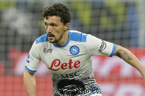 Napoli's Mario Rui controls the ball during the Serie A soccer match between Inter Milan and Napoli at San Siro Stadium, in Milan, Italy, Sunday, Nov. 21, 2021. (AP Photo/Antonio Calanni)