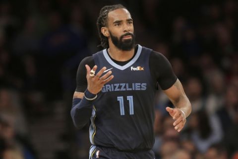 Memphis Grizzlies' Mike Conley gestures during the second half of the NBA basketball game against the New York Knicks, Sunday, Feb. 3, 2019, in New York. The Grizzlies defeated the Knicks 96-84.(AP Photo/Seth Wenig)