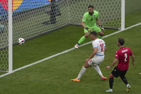 Czech Republic's Patrik Schick scores his side's opening goal during a Group F match between Georgia and the Czech Republic at the Euro 2024 soccer tournament in Hamburg, Germany, Saturday, June 22, 2024. (AP Photo/Sunday Alamba)