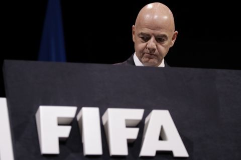 FILE - FIFA President Gianni Infantino walks on the stage before the start of the 69th FIFA congress in Paris, Wednesday, June 5, 2019. FIFA was facing more opposition to its newly-expanded Club World Cup in America on Thursday, June 13, 2024 after World players union FIFPRO said a legal claim had been submitted against the decision to create the tournament. (AP Photo/Alessandra Tarantino, File)