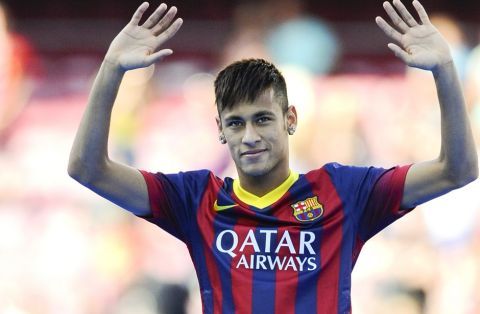 BARCELONA, SPAIN - JUNE 03:  Neymar waves to the crowd during the official presentation as a new player of the FC Barcelona at Camp Nou Stadium on June 3, 2013 in Barcelona, Spain.  (Photo by David Ramos/Getty Images)