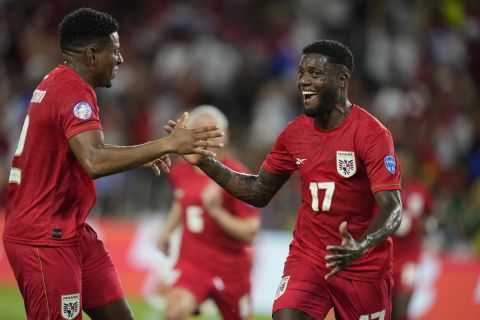 Panama's Jose Fajardo, right, celebrates scoring his side's opening goal against Bolivia during a Copa America Group C soccer match in Orlando, Fla., Monday, July 1, 2024. (AP Photo/John Raoux)