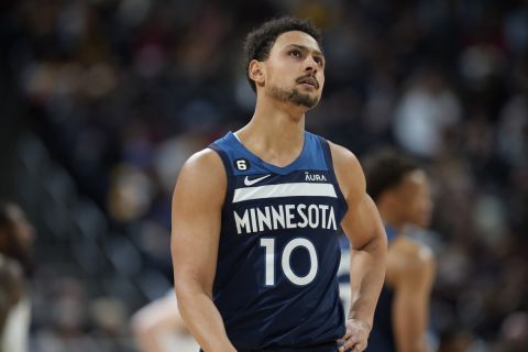 Minnesota Timberwolves guard Bryn Forbes (10) in the second half of an NBA basketball game Tuesday, Feb. 7, 2023, in Denver. (AP Photo/David Zalubowski)