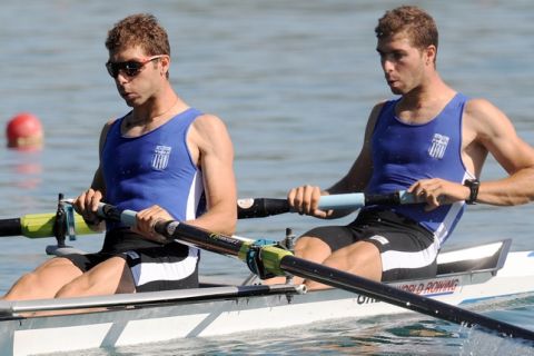 (L) NIKOLAOS GKOUNTOULAS & (R) APOSTOLOS GKOUNTOULAS (BOTH GREECE) COMPETE AT MEN'S PAIR HEAT DURING DAY 1 FISA ROWING WORLD CUP ON ESTANY LAKE IN BANYOLES, SPAIN...BANYOLES , SPAIN , MAY 29, 2009..( PHOTO BY ADAM NURKIEWICZ / MEDIASPORT )..PICTURE ALSO AVAIBLE IN RAW OR TIFF FORMAT ON SPECIAL REQUEST.