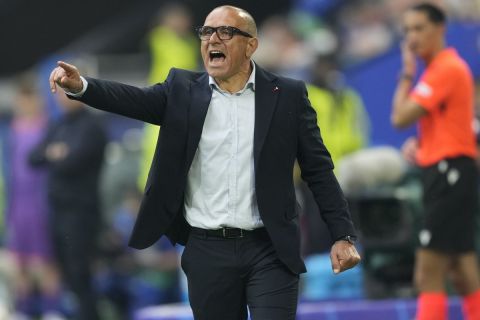 Slovakia's head coach Francesco Calzona gives instructions during the Group E match between Slovakia and Ukraine at the Euro 2024 soccer tournament in Dusseldorf, Germany, Friday, June 21, 2024. Ukraine won 2-1. (AP Photo/Martin Meissner)