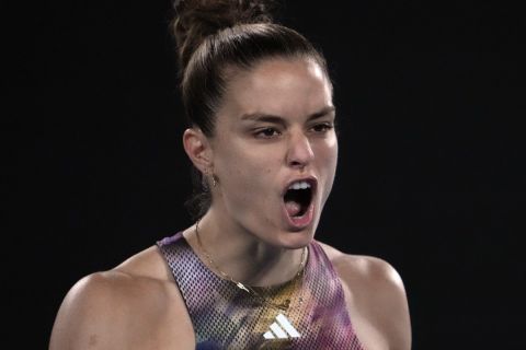 Maria Sakkari of Greece reacts after winning a point against Diana Shnaider of Russia during their second round match at the Australian Open tennis championship in Melbourne, Australia, Wednesday, Jan. 18, 2023. (AP Photo/Ng Han Guan)