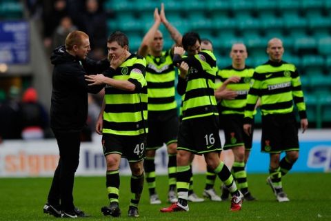 EDINBURGH, SCOTLAND - JANUARY 15:  Celtic manager Neil Lennon (l) congratulates player James Forrest after the Clydesdale Bank Premier League match between Hibernian and Celtic at Easter Road on January 15, 2011 in Edinburgh, Scotland.  (Photo by Stu Forster/Getty Images)