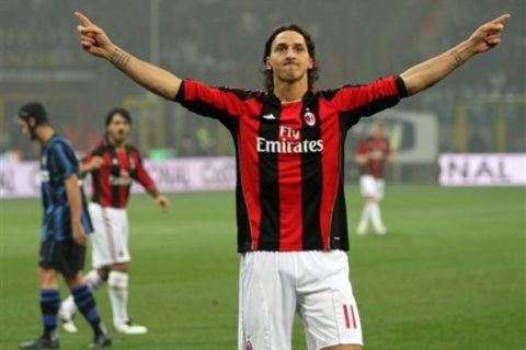 AC Milan forward Zlatan Ibrahimovic, of Sweden, reacts after scoring a penalty kick during the Serie A soccer match between Inter Milan and AC Milan at the San Siro stadium in Milan, Italy, Sunday, Nov. 14, 2010. (AP Photo/Felice Calabro')