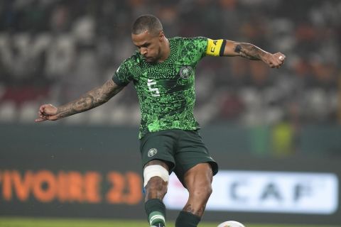 Nigeria's William Troost-Ekong scores from the penalty spot during the African Cup of Nations semifinal soccer match between Nigeria and South Africa, at the Peace of Bouake stadium in Bouake Bouake, Ivory Coast, Wednesday, Feb. 7, 2024. (AP Photo/Themba Hadebe)