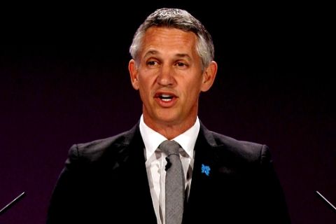 FILE- In this Tuesday, April 24, 2012, file photo, former England soccer player Gary Lineker speaks ahead of the draw for the London 2012 Olympic Soccer tournament, at Wembley Stadium in London. A list of top earners at the BBC shows that men dominate the highest paid jobs despite pledges to grant women equal pay. The BBC said Wednesday, July 11, 2018 its top earner is soccer presenter Gary Lineker, who took home between 1.75 million pounds ($2.32 million) and 1.76 million pounds. (AP Photo/Kirsty Wigglesworth, file)