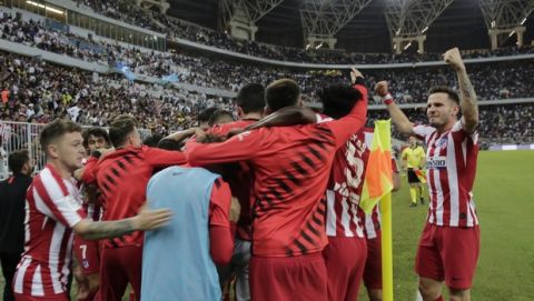 Atletico Madrid's Angel Correa after scoring his side's third goal during the Spanish Super Cup semifinal soccer match between Barcelona and Atletico Madrid at King Abdullah stadium in Jiddah, Saudi Arabia, Thursday, Jan. 9, 2020. (AP Photo/Hassan Ammar)