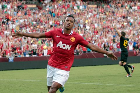 LANDOVER, MD - JULY 30: Nani #17 of  Manchester United celebrates scoring a first half goal against Barcelona during a friendly match at FedExField on July 30, 2011 in Landover, Maryland.  (Photo by Rob Carr/Getty Images)