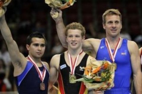 Second placed Vlasios Maras from Greece, first placed Fabian Hambuechen from Germany, and the two third placed, Aljaz Pegan from Slovenia and Umit Samiloglu from Turkey pose, from left,  with their medals of the horizontal bar competition in the apparatus finals at the European Men's Artistic Gymnastics Championships on Sunday May 11, 2008 at the Malley Sport Centre in Lausanne, Switzerland. (AP Photo/KEYSTONE/Laurent Gillieron) *** NO COMMERCIAL USE, EDITORIAL USE ONLY ***