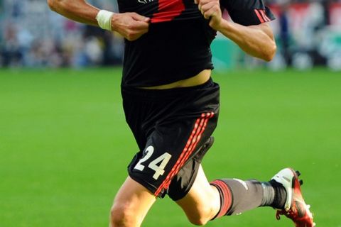 LEVERKUSEN, GERMANY - AUGUST 14: Michal Kadlec of Leverkusen celebrates after scoring his teams first goal during the Bundesliga match between Bayer 04 Leverkusen and SV Werder Bremen at BayArena on August 14, 2011 in Leverkusen, Germany.  (Photo by Lars Baron/Bongarts/Getty Images)