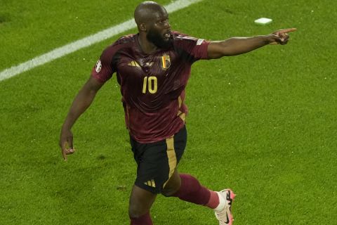 Belgium's Romelu Lukaku celebrates after scoring a goal that was then disallowed for offside during a Group E match between Belgium and Romania at the Euro 2024 soccer tournament in Cologne, Germany, Saturday, June 22, 2024. (AP Photo/Frank Augstein)