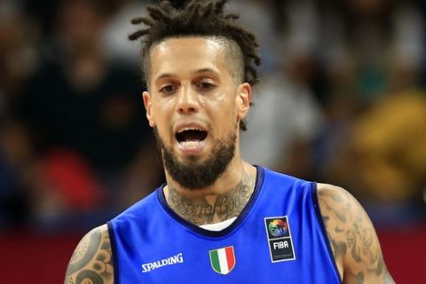 Italy's Daniel Hackett gives instructions to his players during their Eurobasket European Basketball Championship round of 16 match against Finland, in Istanbul, Saturday, Sept. 9. 2017. (AP Photo/Lefteris Pitarakis)