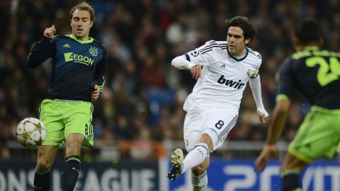 Real Madrid's Brazilian midfielder Kaka (R) scores during the UEFA Champions League football match Real Madrid FC vs Ajax Amsterdam at the Santiago Bernabeu stadium in Madrid on December 4, 2012.   AFP PHOTO / PIERRE-PHILIPPE MARCOU        (Photo credit should read PIERRE-PHILIPPE MARCOU/AFP/Getty Images)