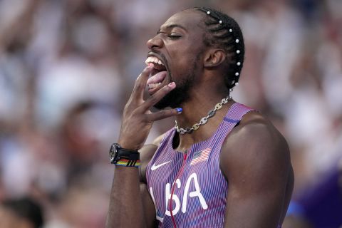 Noah Lyles, of the United States, reacts ahead of his men's 100-meters semifinal at the 2024 Summer Olympics, Sunday, Aug. 4, 2024, in Saint-Denis, France. (AP Photo/Bernat Armangue)