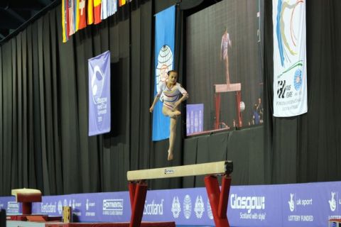 Raluca Oana Haidu, ROU stretching out her leg to land during her Balance Beam routine at the International Gymnastic Grand Prix in Glasgow.